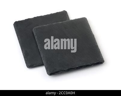 Two black square empty slate stone plates isolated on white Stock Photo