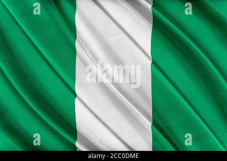 Colorful Nigeria flag waving in the wind. Stock Photo