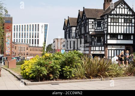 The busy shopping area of Trinity Street near the Broadgate central area of Coventry. The area is being prepared ready for the City becoming City of culture 2021 Stock Photo