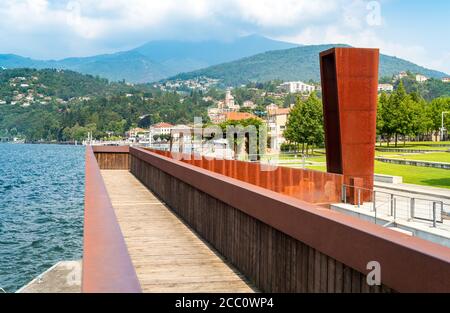 View of Luino lakefront park on the lake Maggiore in hot summer day, Lombardy, Italy Stock Photo