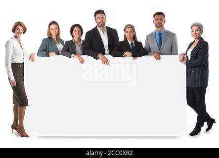 Business people group with blank banner isolated over white Stock Photo