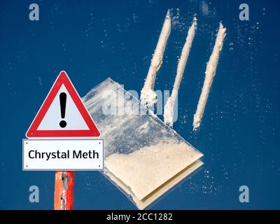 Drugs Lines on a mirror with bag warning sign Stock Photo