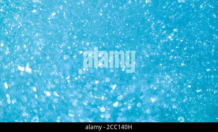 Abstract background blue bokeh circles and dots texture Stock Photo