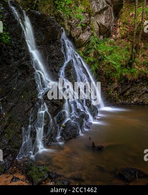 Waterfalls in The Fairy Glen on the Black Isle in the Highlands of Scotland, the glen is a nature reserve located near the village of Rosemarkie. Stock Photo