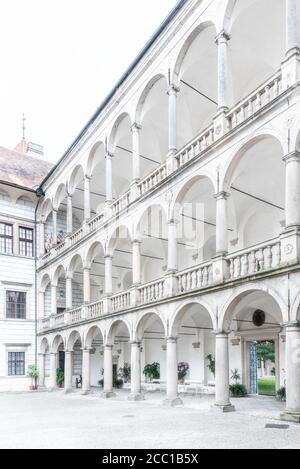 Great arcades - white renaissance archs on Third Courtyard of Jindrichuv Hradec Castle in Jindrichuv Hradec, Czech Republic. Stock Photo