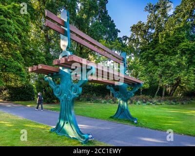 Giant seat across a path in the Jardin des Plantes - Nantes, Loire-Atlantique, France. Stock Photo