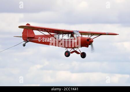 1961 Piper Super Cub airborne at Shuttleworth Drive-in Airshow on the 2nd August 2020 Stock Photo