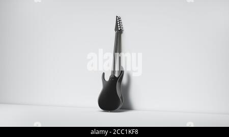 Blank black electric guitar mockup, stand near wall, backside view Stock Photo