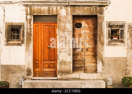Old wooden italian door in the small village of Scanno Stock Photo