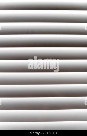 Black and white blinds close up texture portrait Stock Photo