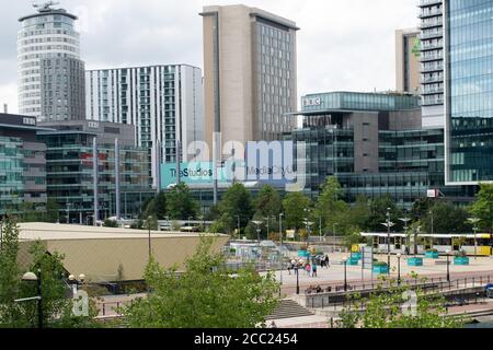 Media city, Salford Quays, Manchester UK. Aerial shot including BBC, University of Salford and Metrolink tram . Stock Photo