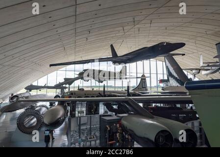 Inside the American Air Museum, Imperial War Museum, Duxford, Cambridgeshire, UK. Lockheed U2, over C-47, over B-29 Stock Photo