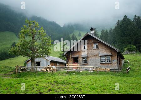 Switzerland, View of mountain hut in swiss alps Stock Photo