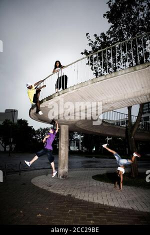 Germany, Cologne, Young people having fun together Stock Photo