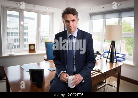 Secretary of State for Education Gavin Williamson in his office at the Department of Education in Westminster, London, following the announcement that A-level and GCSE results in England will now be based on teachers' assessments of their students, unless the grades produced by the controversial algorithm are higher.