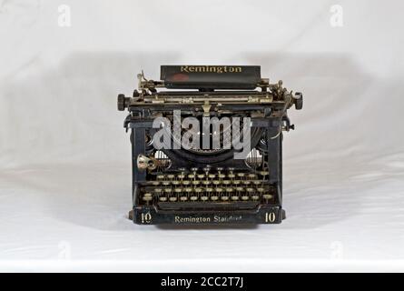 A 1920 Remington Standard #10 typewriter, constructed between 1908 and 1920, on a white background. Stock Photo