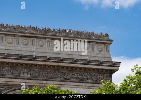 Close-up of people on the arc de triomphe. The roof of arc de triomphe covered with tourist. Paris - France, 31. may 2019 Stock Photo