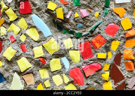 Natural background of a crushed mosaic of different colours. Stock Photo