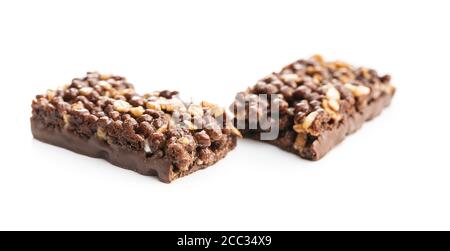Chocolate cereal bars. Tasty protein bars isolated on white background. Stock Photo