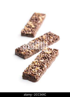 Chocolate cereal bars. Tasty protein bars isolated on white background. Stock Photo