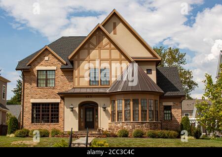 Frederick, MD, USA 08/14/2020: A stylish elegant house in downtown Frederick. This single family home has decorative stones and bricks on the exterior Stock Photo