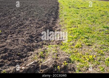 loose soil before planting vegetables on a spring day, agriculture Stock Photo