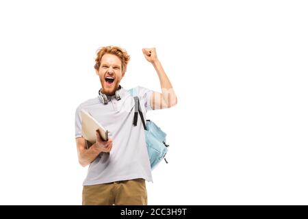 Student with backpack and notebook showing yes gesture isolated on white Stock Photo