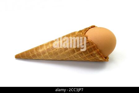 egg in waffle cup isolated Stock Photo
