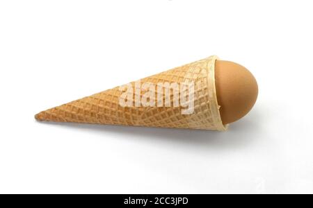 egg in waffle cup isolated Stock Photo