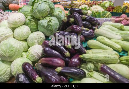 Exhibition of vegetables to sell in Brazil, where cabbages, aubergines, zucchinis and other vegetables appear in the background. Free trade fair for a Stock Photo