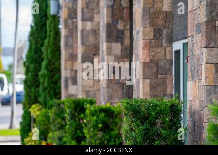Exterior office building with landscaping green hedges Stock Photo