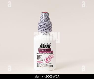 Davis, CA, Aug 16, 2020. Sealed bottle of Afrin nose drops for nasal congestion relief, nasal spray, 12 hours, isolated on white background Stock Photo