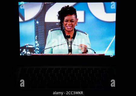 A photo illustration of a laptop computer screen shows Representative Gwen Moore (D-WI) speaking on the first night of the 2020 Democratic National Convention, which is being held almost entirely virtually, in Washington, DC, on August 17, 2020 amid the Coronavirus pandemic. In contrast to the Republican National Committee whose convention is yet to take place, early-on the Democratic National Committee redrew their plans for an in-person convention in Milwaukee, and quickly put together a smoothly run digital convention with a mix of pre-recorded and live speeches. (Graeme Sloan/Sipa USA) Stock Photo