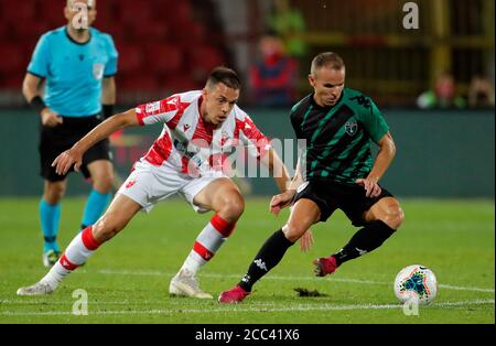 Belgrade. 18th Aug, 2020. Crvena Zvezda's El Fardou Ben Nabouhane (L)  celebrates goal with teammates during UEFA Champions League first  qualifying round football match between Crvena Zvezda and Europa FC in  Belgrade