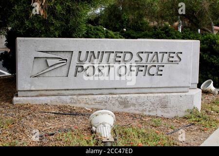 Goleta, California, USA. 17th Aug, 2020. United States Post Office Sign at Goleta Post Office, where a popular mailbox in the drive-through went missing, and people left memorial flowers in protest. Credit: Amy Katz/ZUMA Wire/Alamy Live News Stock Photo