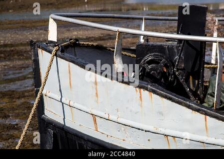 Old fishing boat bow section in a seaside harbour Stock Photo