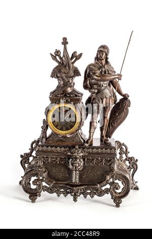 Studio photo of bronze antique mantel clock on white background. France. 19th century Stock Photo