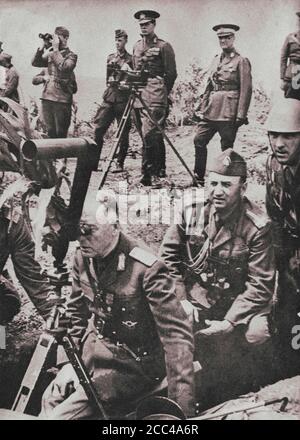 King of Romania Mihai I (in the center, in the second row) watches the course of military exercises of the Romanian army against the Soviet troops. In Stock Photo