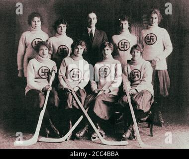 Retro photo of a Canadian women's ice hockey team from Edmonton with a swastika sign on their sweaters. 1916 Stock Photo