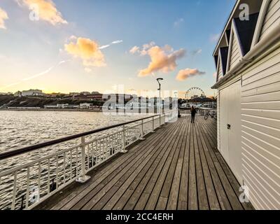 UK. 18th Aug, 2020. Bournemouth, UK. Tuesday 18 August 2020. Sunset over Bournemouth as tourist leave the busy beach. Credit: Thomas Faull/Alamy Live News Stock Photo