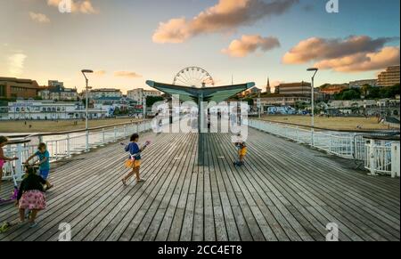 Bournemouth, UK. 18th Aug, 2020. Bournemouth, UK. Tuesday 18 August 2020. Sunset over Bournemouth as tourist leave the busy beach. Credit: Thomas Faull/Alamy Live News Stock Photo