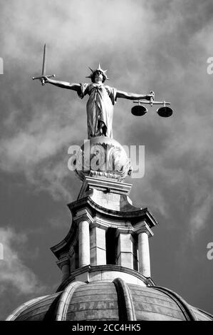 Scales of Justice of the Central Criminal Court fondly known as the Old Bailey in London England, UK which a popular tourism travel destination visito Stock Photo