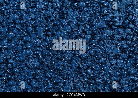 New blue asphalt. Textured, background. Flat lay. Close up. Stock Photo