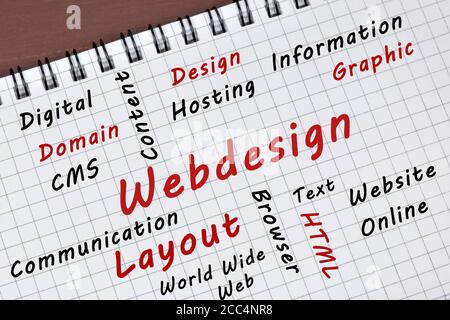 Webdesign word on a notepad page close up Stock Photo