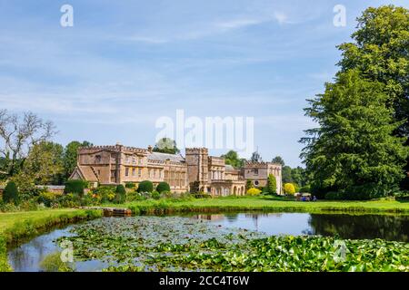View of Forde Abbey, an historic former Cistercian monastery, across Mermaid Pond, Chard, Somerset, south-west England, Stock Photo