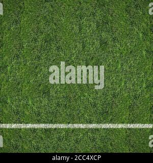 Vertical top view of a soccer field with a single white line on the grass Stock Photo