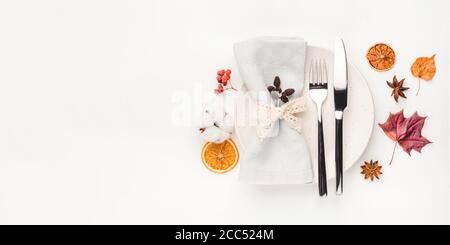 Thanksgiving autumn background decorated with autumn leaves, berries and spices. Stock Photo