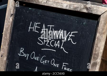 Pub chalkboard saying 'Heatwave Special', London, UK Stock Photo
