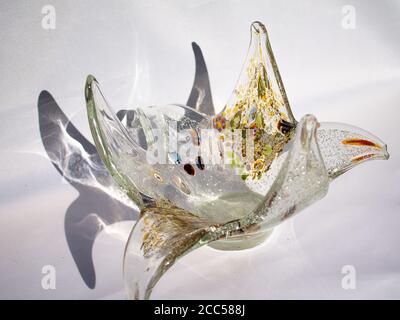 Murano mouth-blown clear glass bowl. Inside we find several murilles and real silver paint. Stock Photo