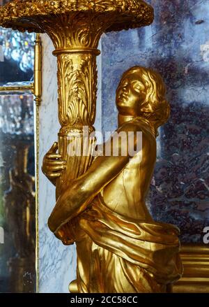 Statue in the Hall of Mirrors in the palace of Versailles - France Stock Photo